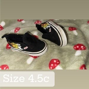 Vans Kids Black Slip-On Sneakers with Flame Design